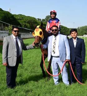 Deus Ex Machina (Hasib Alam up) winner of the OBLIGADO TROPHY, being led in by trainer Ranjeet Shinde on Thursday racecs at Mysore.